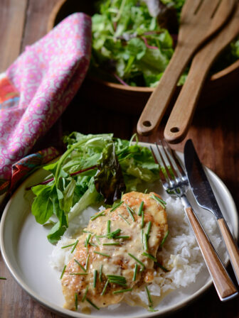 Mustard cream sauce chicken over rice.