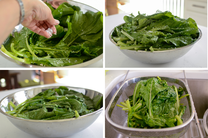 Turnip greens are sprinkled with salt for brine and drained.