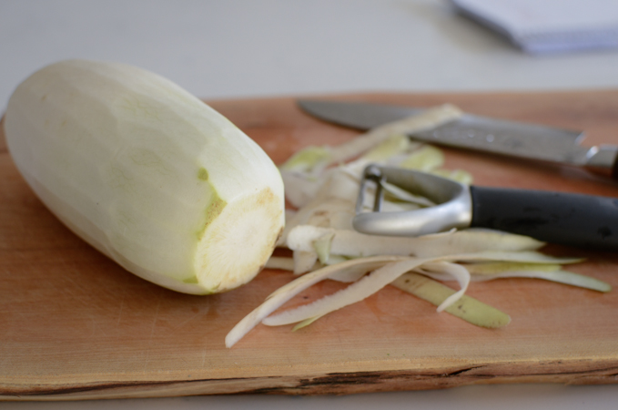 Peel Korean radish with a vegetable peeler