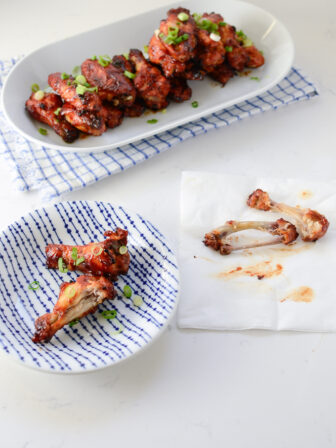 These baked chicken wings with sweet and spicy glaze are perfect finger food.
