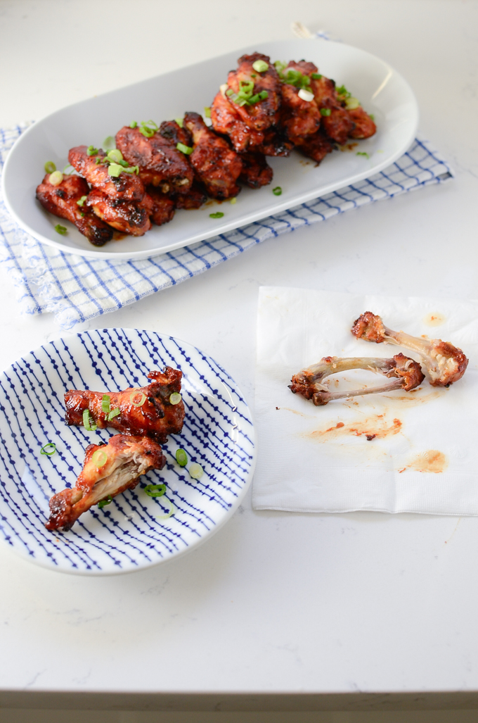 These baked chicken wings with sweet and spicy glaze are perfect finger food.