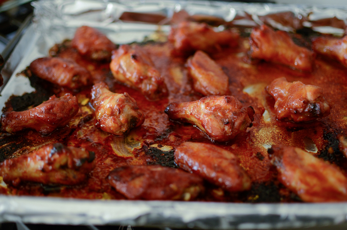 Chicken wings are baked again to ensure the even cooking and extra glaze.