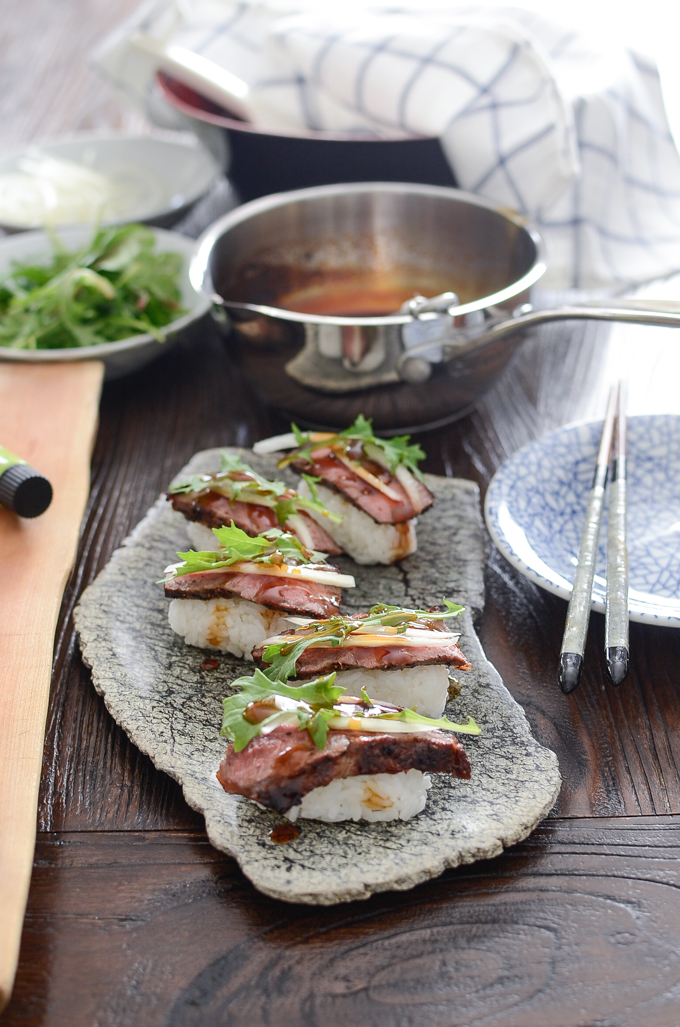 Beef Steak Sushi is adorned with homemade teriyaki sauce.