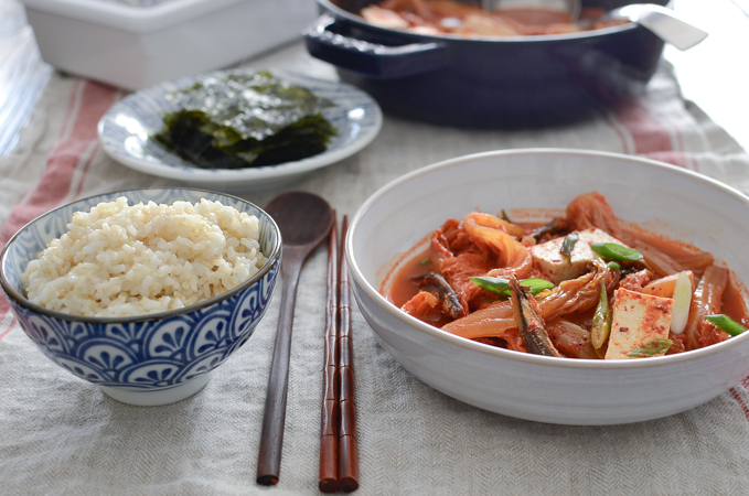 Rice and kimchi stew is served together with roasted seaweed together.