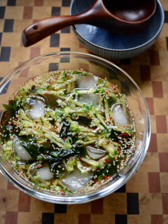 Cold ice keeps this Korean Cold Seaweed Cucumber Soup chilled.