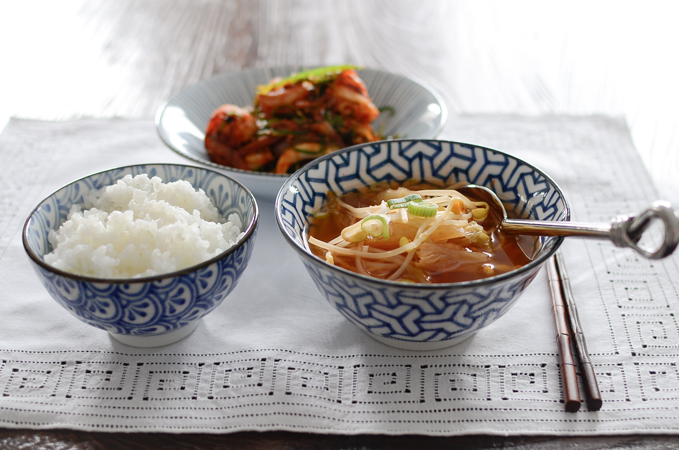 Kimchi Bean Sprout Soup are served with rice and Korean side dish.