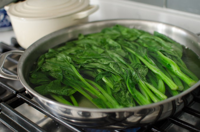 Blanching deep green vegetables is a great method to get rid of bitter taste.
