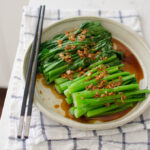 Blanched choy sum is served with soy garlic sauce.