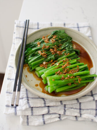 Blanched choy sum is served with soy garlic sauce.