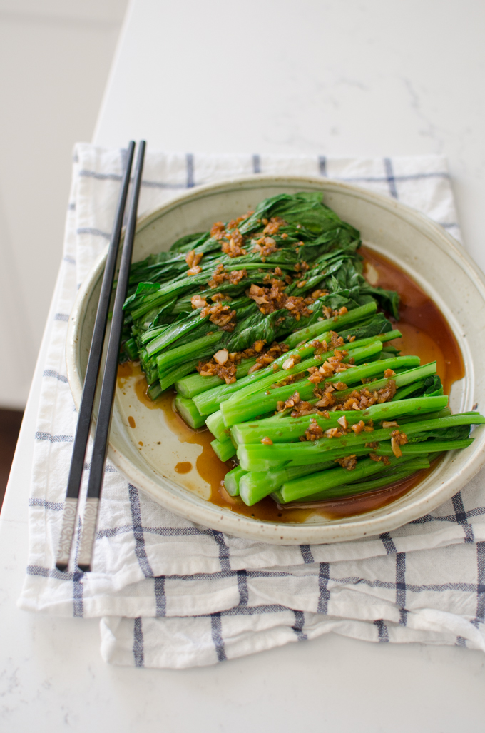 Blanched choy sum is served with soy garlic sauce.