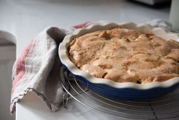 Crustless apple pie showing the crackled finish on top.