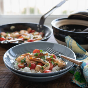 Serve Shrimp and Tomatoes in Lemon Butter Sauce over rice.