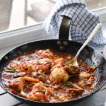 Oyster, soft tofu, and kimchi make an easy one pot meal cooked in a skillet.