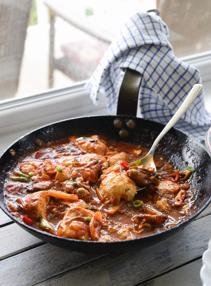 Oyster, soft tofu, and kimchi make an easy one pot meal cooked in a skillet.