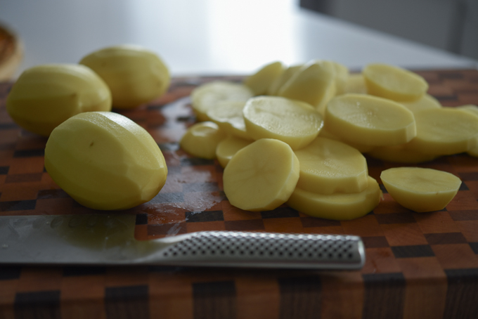 Yukon potatoes cut into slices.