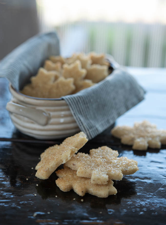 Maple Walnut Cutout Cookies are wrapped in bags to give out as a gift.