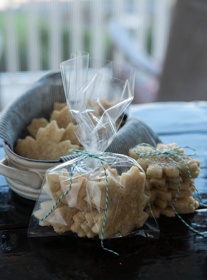 Maple walnut cutout cookies wrapped  in bags tied with strings.