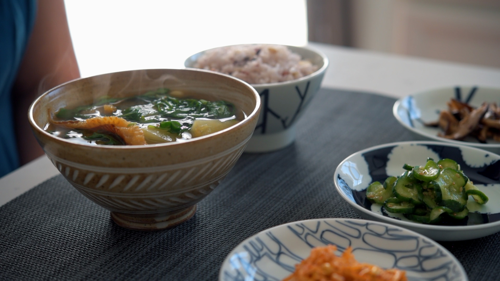 This quick Korean soup with arugula and potato is flavored with dried pollock fish and Korean soybean paste.