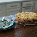 Buttery crisp crumb cake is layered with a moist berry filling