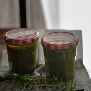 Oregano Pesto & Thyme Pesto are stored in glass jars