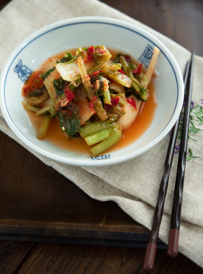 Homemade young cabbage kimchi with radish is fermented.