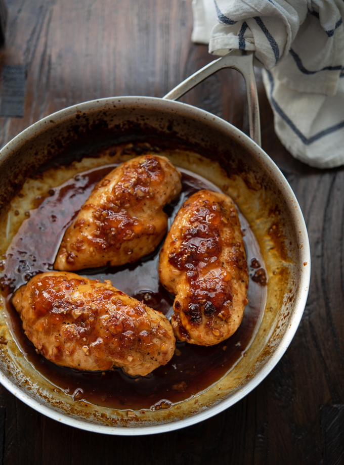 Apricot glazed chicken breasts are cooked with apricot preserve