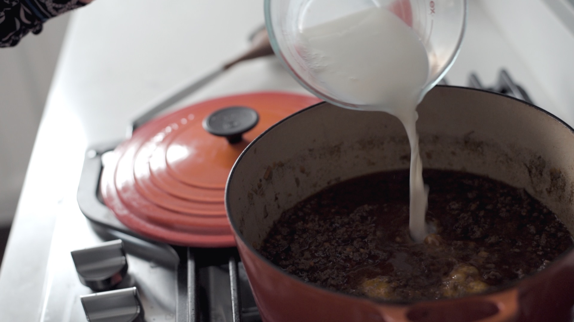 Milk is added to soften up Ragu Bolognese Sauce