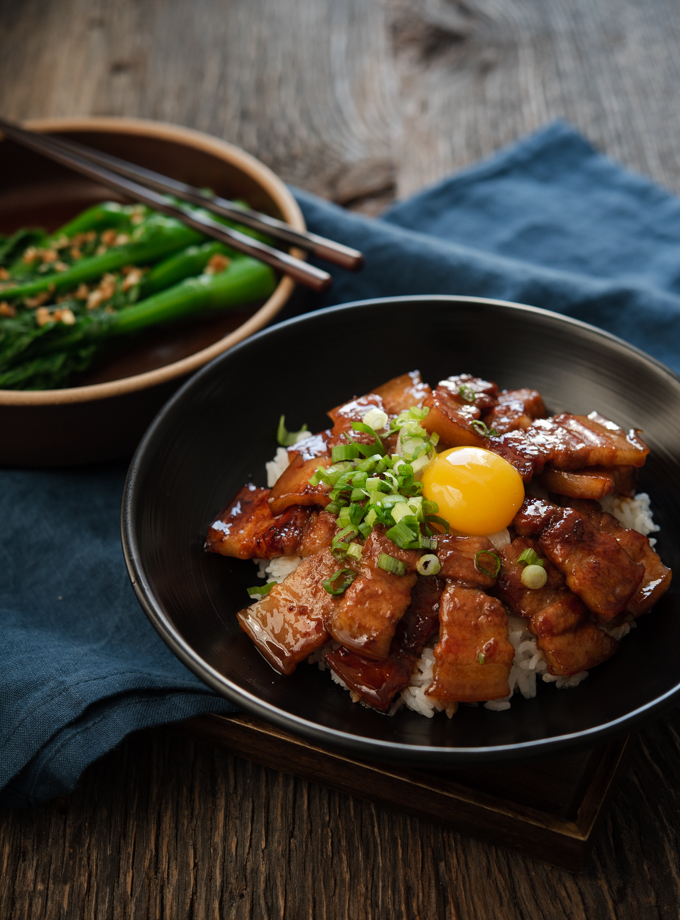 Butadon (Japanese pork belly rice bowl) with green vegetables.