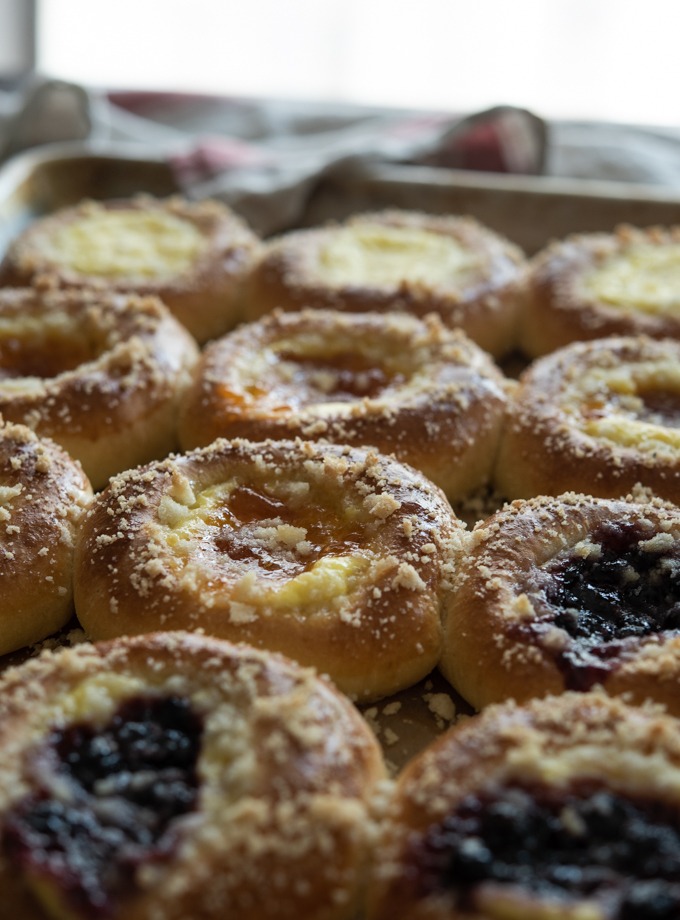 Authentic Czech kolaches with fruit jam, sweet cheese filling, and buttery streusel topping.
