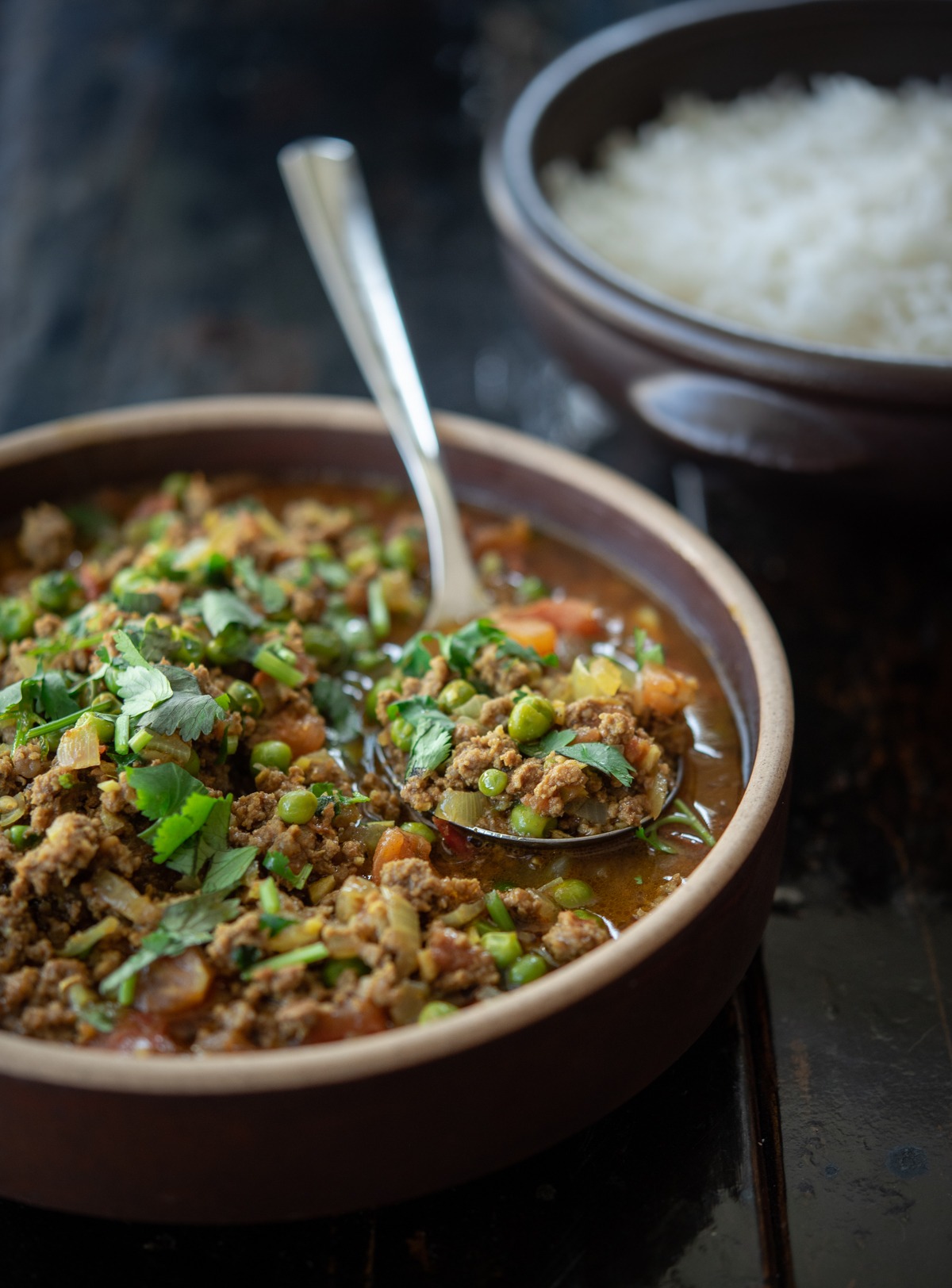 Serve this tomato based ground beef curry over rice for an easy dinner.