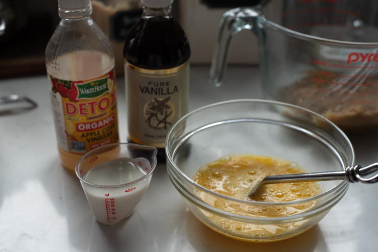 Beaten eggs and other wet ingredients are for making pecan pie filling.