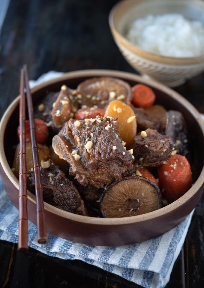 Galbi jjim (Korean Braised Beef Short Ribs) with carrot, radish, and mushroom.