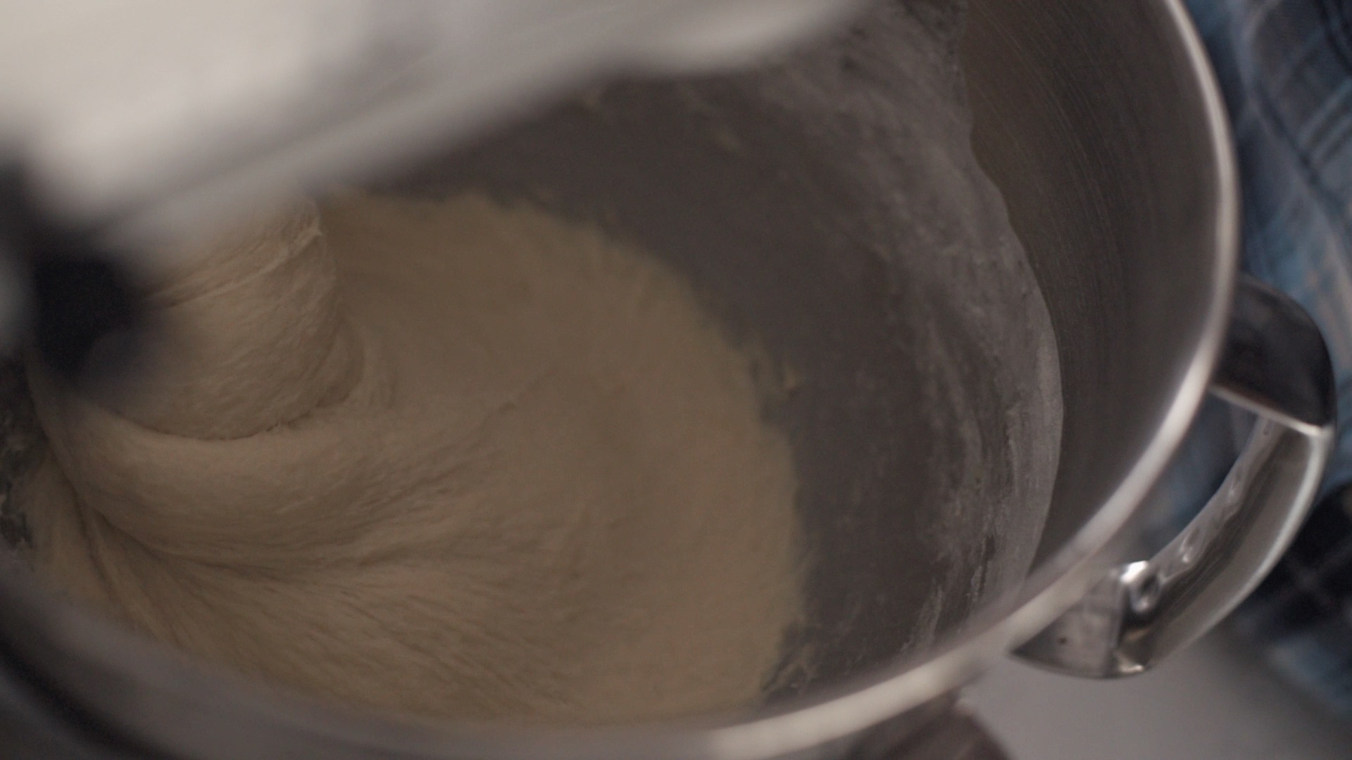 Milk bread dough kneading in a stand mixer
