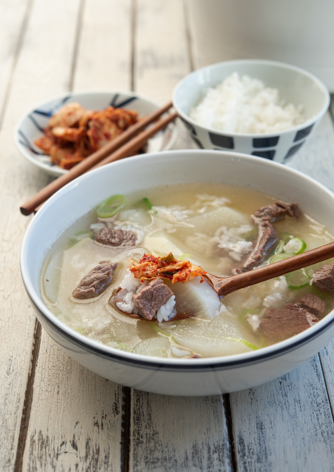 The best way to serve Korean soup is with rice and a little bit of Kimchi