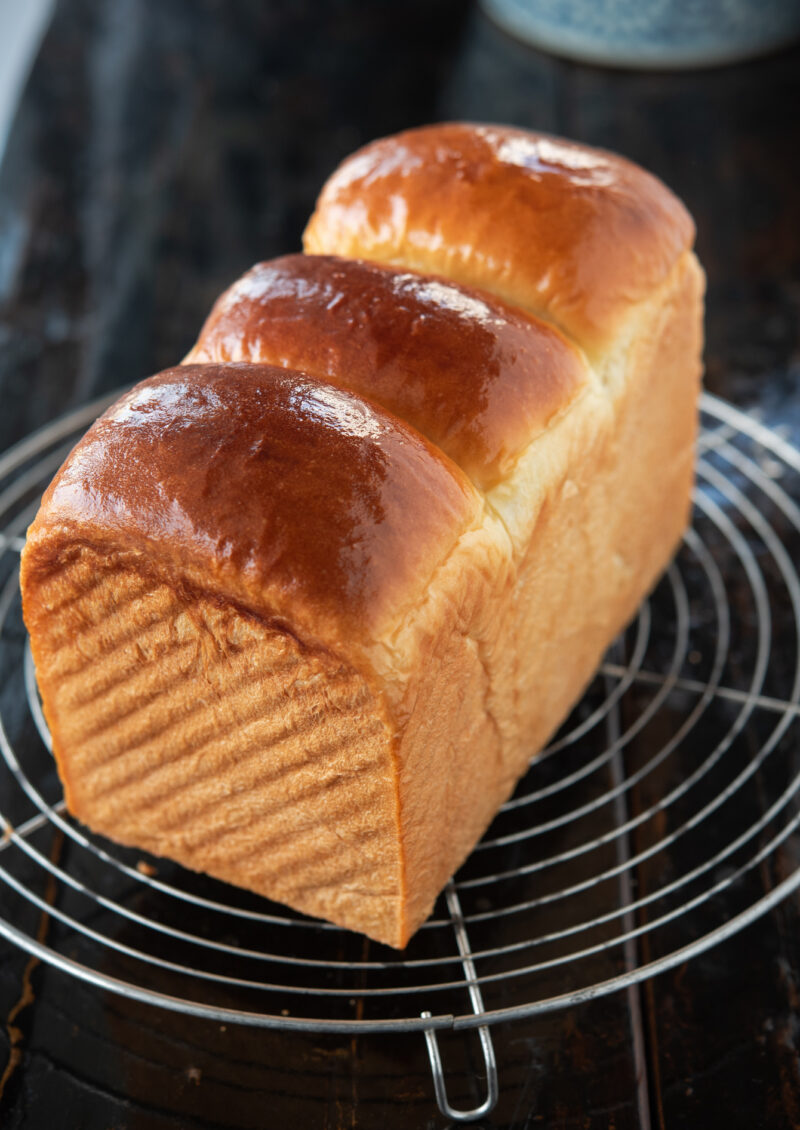 Milk bread recipe with golden brown crust.

