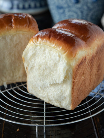 This soft and feathery Asian milk bread is made easily without Tangzhong method.