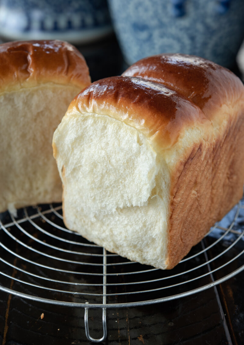 This soft and feathery Asian milk bread is made easily without Tangzhong method.
