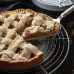 Szarlotka is a popular Polish apple tart with cookie-like dough that's woven into a lattice