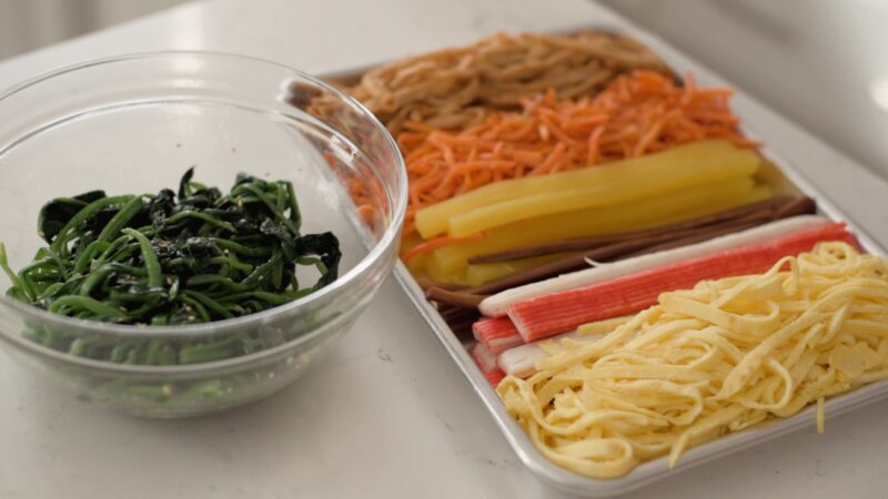 Filling ingredients for Korean seaweed rice rolls are prepared