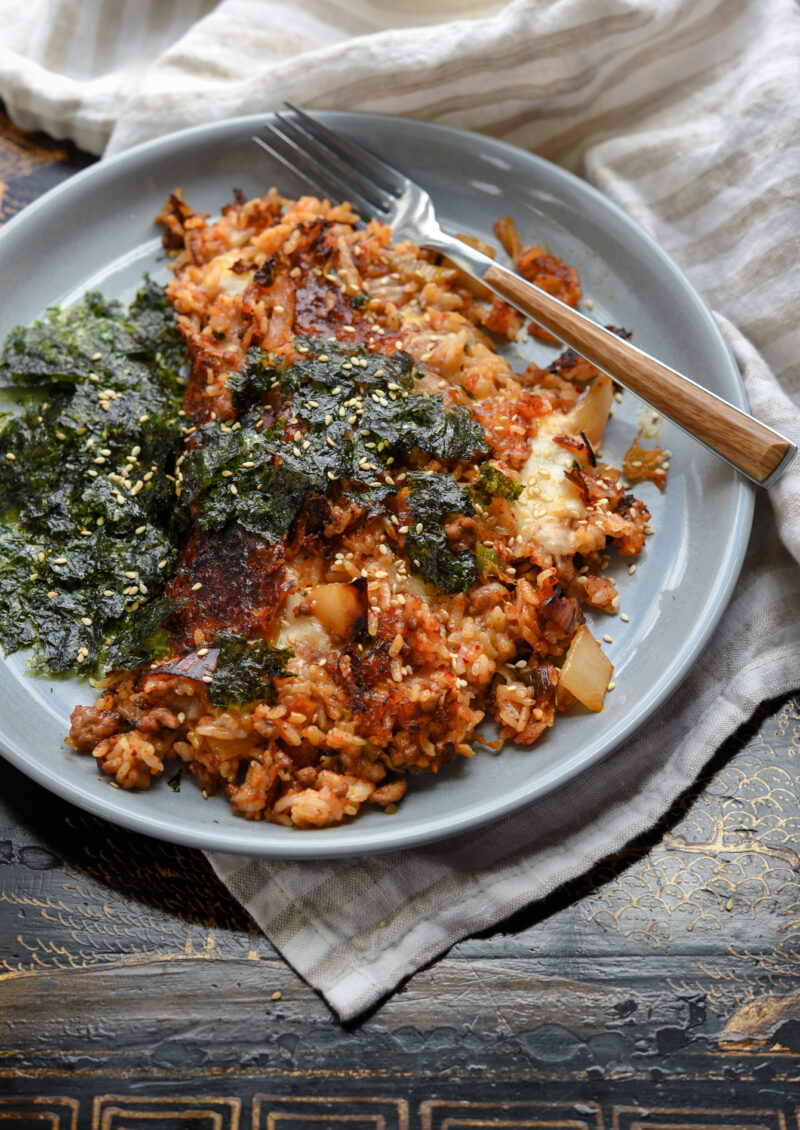 Using a cast iron skillet will help creating the crispy crust on kimchi fried rice