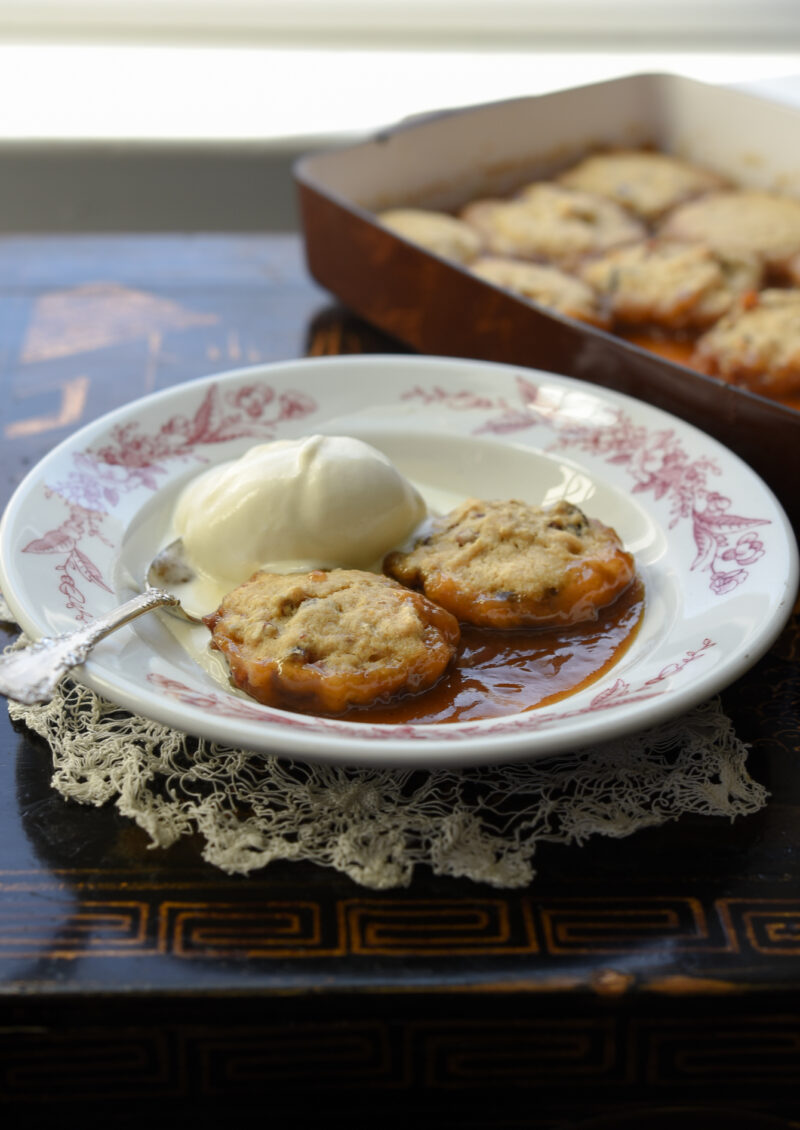 Enjoy date dumplings with a scoop of vanilla ice cream or whipped cream