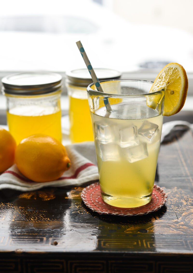 Mix lemonade syrup is mixed with water and ice.