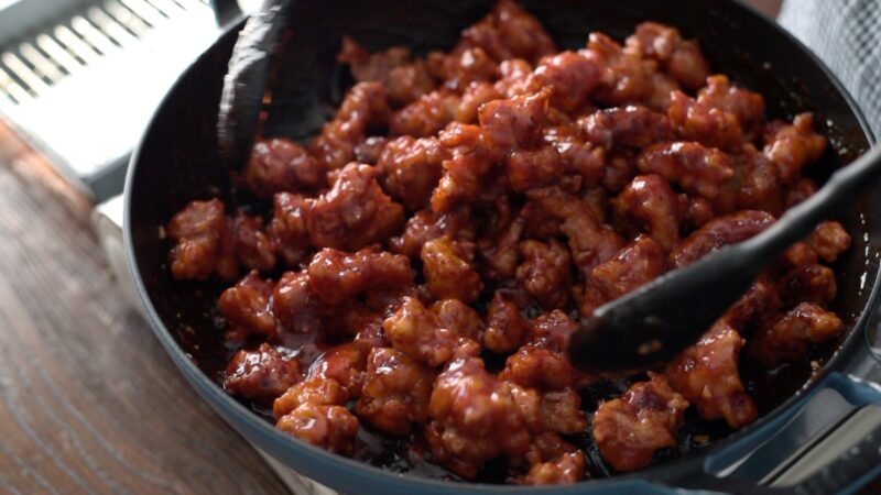 Crispy Korean chicken nuggets are tossed with the sweet and spicy glaze. 