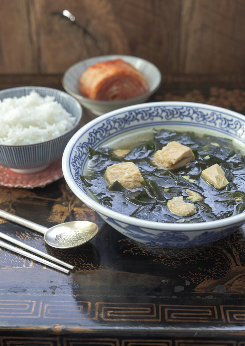 Korean seaweed and canned tuna soup is served with rice and kimchi.