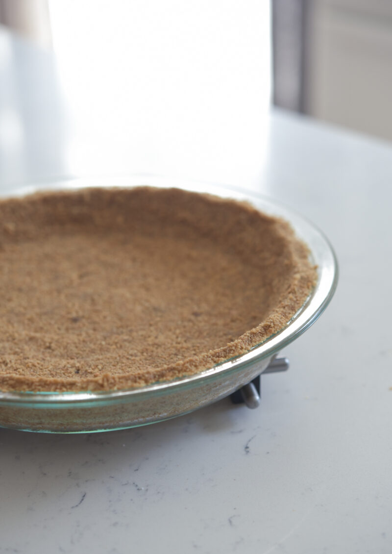 Graham cookie crust for strawberry pie with mascarpone cheese filling.