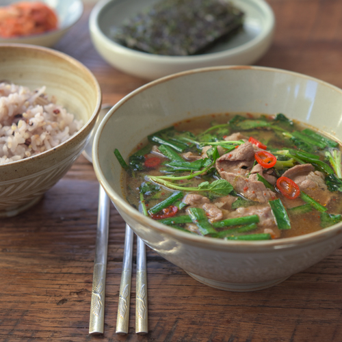 This Korean soybean paste soup is made with beef, watercress and chives