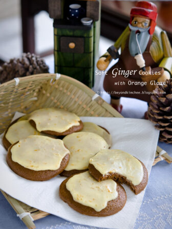 Soft ginger cookies are frosted with orange glaze.