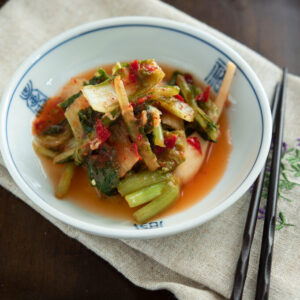 Homemade young cabbage kimchi with radish is fermented.