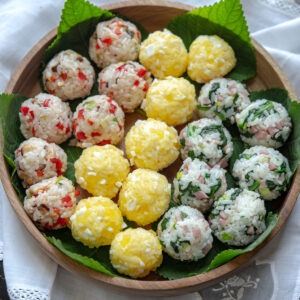 3 colorful rice balls (jumeokbap) using leftover rice in a serving bowl