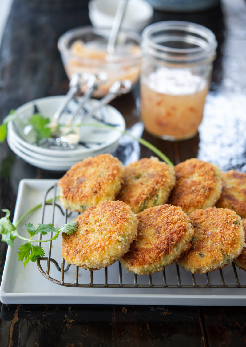 Serve these golden crisp Thai crab cakes with sriracha mayo and homemade sweet chili sauce